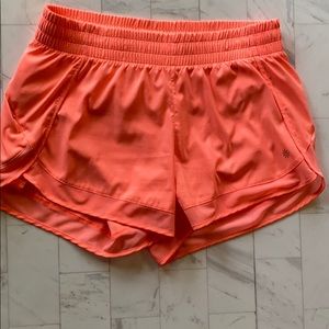 Island coral size M Athleta mesh racer 4” shorts
